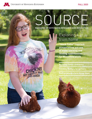 Source Fall 2020 cover; girl doing outdoor chicken demonstration