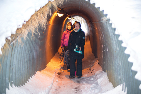 Youth in snow tunnel