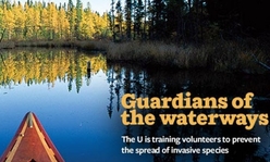Legacy magazine cover: canoe on lake