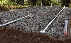 Septic system drainfield installation.