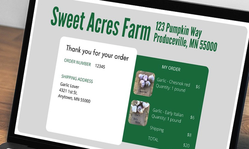 Laptop with online invoice from "Sweet Acres Farm, 123 Pumpkin Way, Produceville, MN 55000" showing on the screen.
