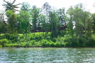 Lake cabin with natural shoreline.