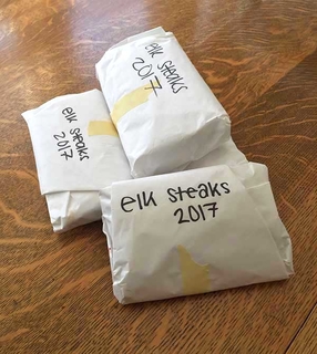 Frozen elk meat packages.