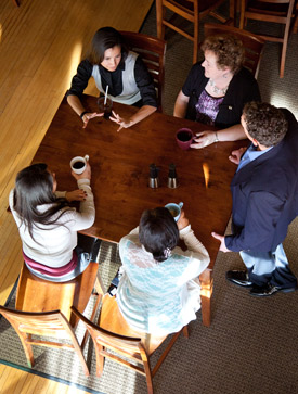 Small group meeting over coffee