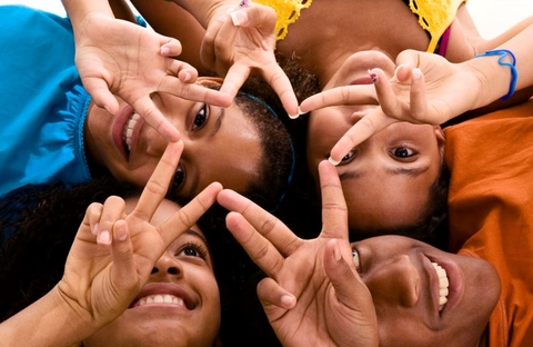 five kids making one star with their fingers